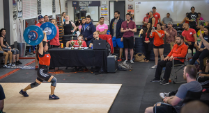 Iron Athlete Coach Becky Vasey lifting in a competition at East Valley CrossFit