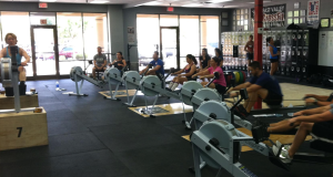 Iron Athlete coach Kare Williams leading a Rowing Clinic at East Valley CrossFit