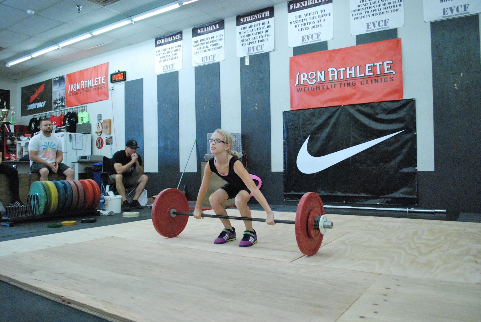 Young Girl Lifting At An Iron Athlete Competition